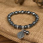 Shiny Black Gallstone Jerusalem - Inspired Bracelet: A Symbol of Faith