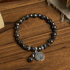 Shiny Black Gallstone Jerusalem - Inspired Bracelet: A Symbol of Faith