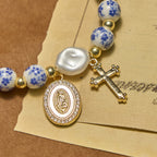 Our Lady Medal & Cross Floral-Inspired Bracelet: Faith Meets Style