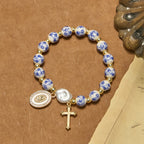 Our Lady Medal & Cross Floral-Inspired Bracelet: Faith Meets Style
