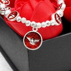 Enamel Holy Spirit with Cross and Rose Beads Bracelet: Cherished Symbol of Blessed Protection
