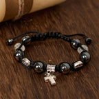 Hematite Bead Bracelet with Cross & St. Benedict: Solemn Reminder of Spiritual Roots