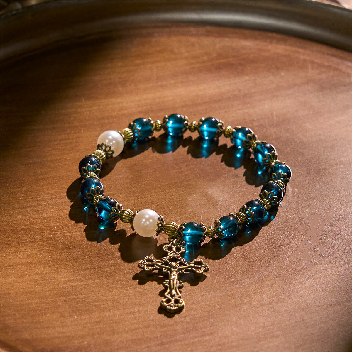 Spiritual Blue Gloss Bead Bracelets Featuring Sacred Brass Crucifix