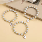 Elegant Clean White & Golden Cross Bead Bracelet: Pure Grace Every Day