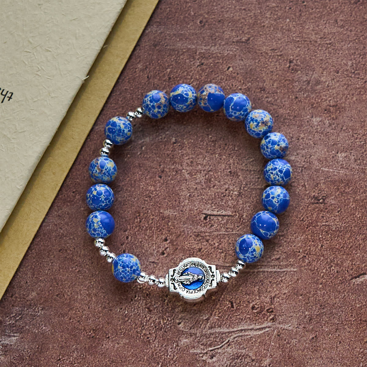 Blue Imperial Stone Marian Bracelet: A Token of Prayer and Peace