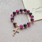 Grace and Strength Black-Pink Glass Bead Bracelet with Golden Cross