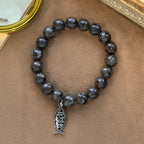 Glowing Flame-Stone Color-Shifting Bracelet with Ichthus Pendant