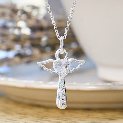 Angel Cross & Zircon Necklaces: Soft Comfort with Sacred Symbolism