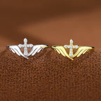 Silver Cross Wing Ring with Cubic Zirconia Accents: Embody His Angelic Protection