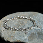 Curb Chain Bracelet with Dangling Cross Charms: Embody His Bold Grace