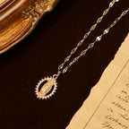 Oval Our Lady Necklace with Encircled Cubic Zirconia: Embody Her Tender Grace