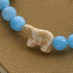 Blue Bead Polar Bear Handmade Cross Bracelet: Save Our Polar Bears