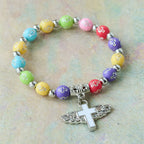 Winged Cross Charm Bracelet: A Visual Prayer of Devotion and Connection