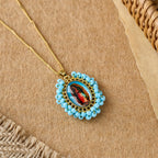 Marian Icon Beaded Oval Pendant Necklace: A Token of Virgin Mary Devotion