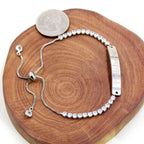 Four-Color Metal with Engraved/Blank Bar Faith Courage Bracelet