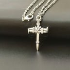 Nail Cross Link Necklace: A Symbol of Sacred Strength and Redemption