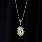 Filigree Frame Our Lady Portrait Necklace: A Symbol of Sacred Grace and Divine Light