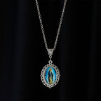 Filigree Frame Our Lady Portrait Necklace: A Symbol of Sacred Grace and Divine Light