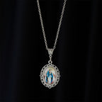 Filigree Frame Our Lady Portrait Necklace: A Symbol of Sacred Grace and Divine Light