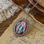 Filigree Frame Our Lady Portrait Necklace: A Symbol of Sacred Grace and Divine Light