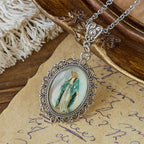 Filigree Frame Our Lady Portrait Necklace: A Symbol of Sacred Grace and Divine Light
