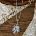 Filigree Frame Our Lady Portrait Necklace: A Symbol of Sacred Grace and Divine Light