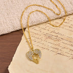 Zircon-Encrusted Heart Cross Necklace with Angel Wings: A Symbol of Divine Love & Grace