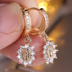 Our Lady Zircon Halo Huggie Earrings with Sunburst Medallion