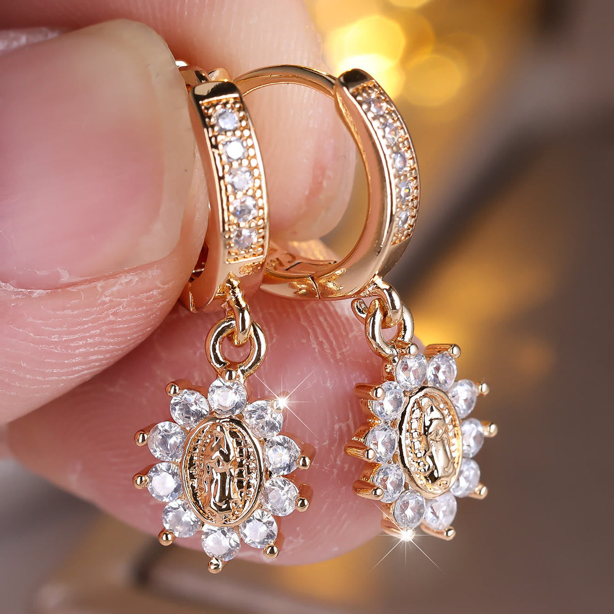 Our Lady Zircon Halo Huggie Earrings with Sunburst Medallion