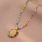 Beaded Border Our Lady Medal Necklace: Emblem of Marian Devotion
