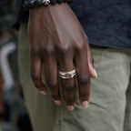 Medieval cross iris ring worn by a woman