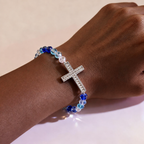White & Peacock Blue Cross Bracelet: Belief Wrapped in Shimmer